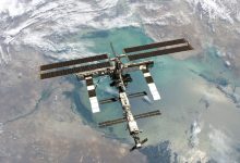 A communications satellite orbiting Earth