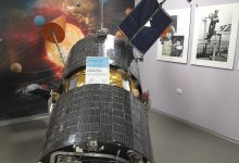 communications satellite orbiting above Earth