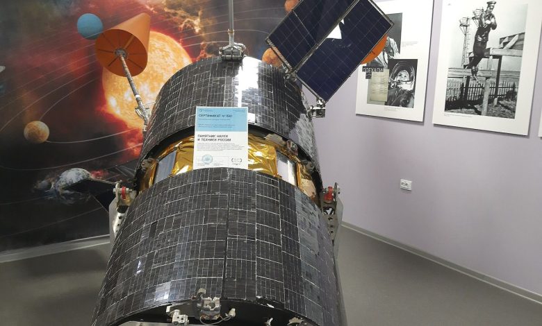 communications satellite orbiting above Earth