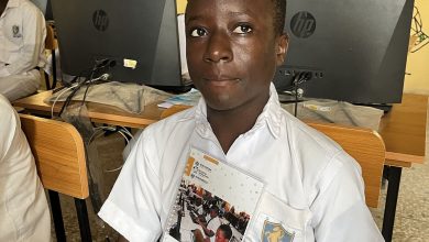 Students studying with books and notes for an exam